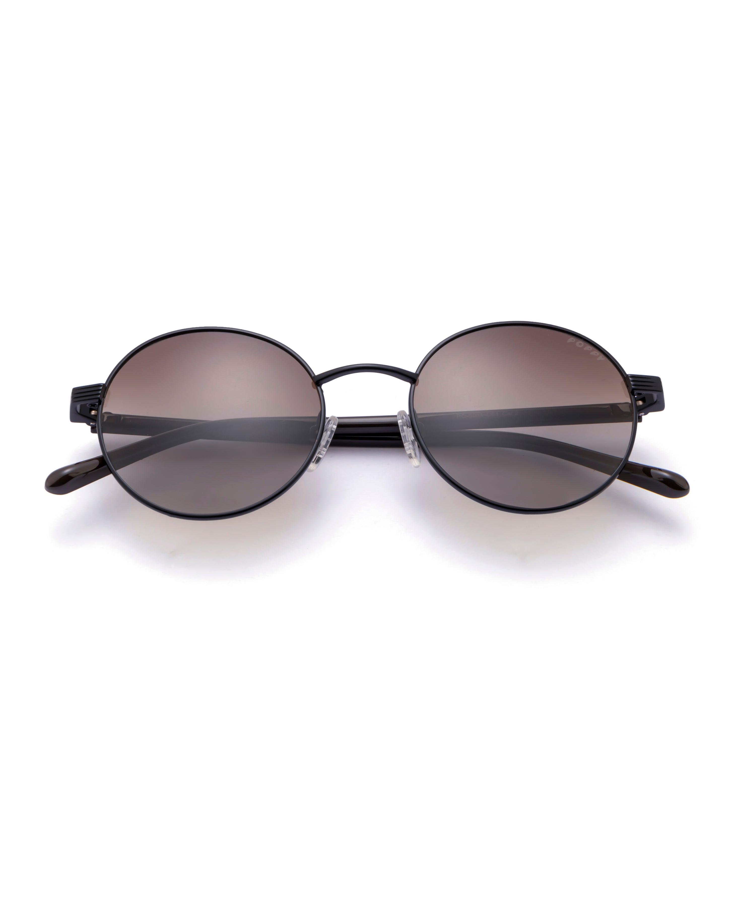 serve unisex black round metal shades poppy eyewear